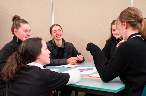 Project empower participants talking as a group